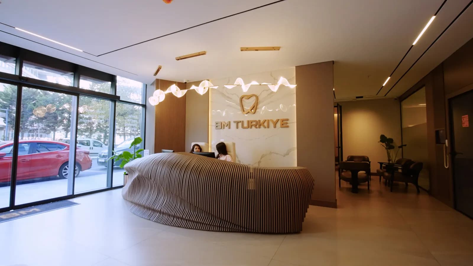 The reception of the BM Turkiye clinic in Istanbul, with the BM logo on the wall